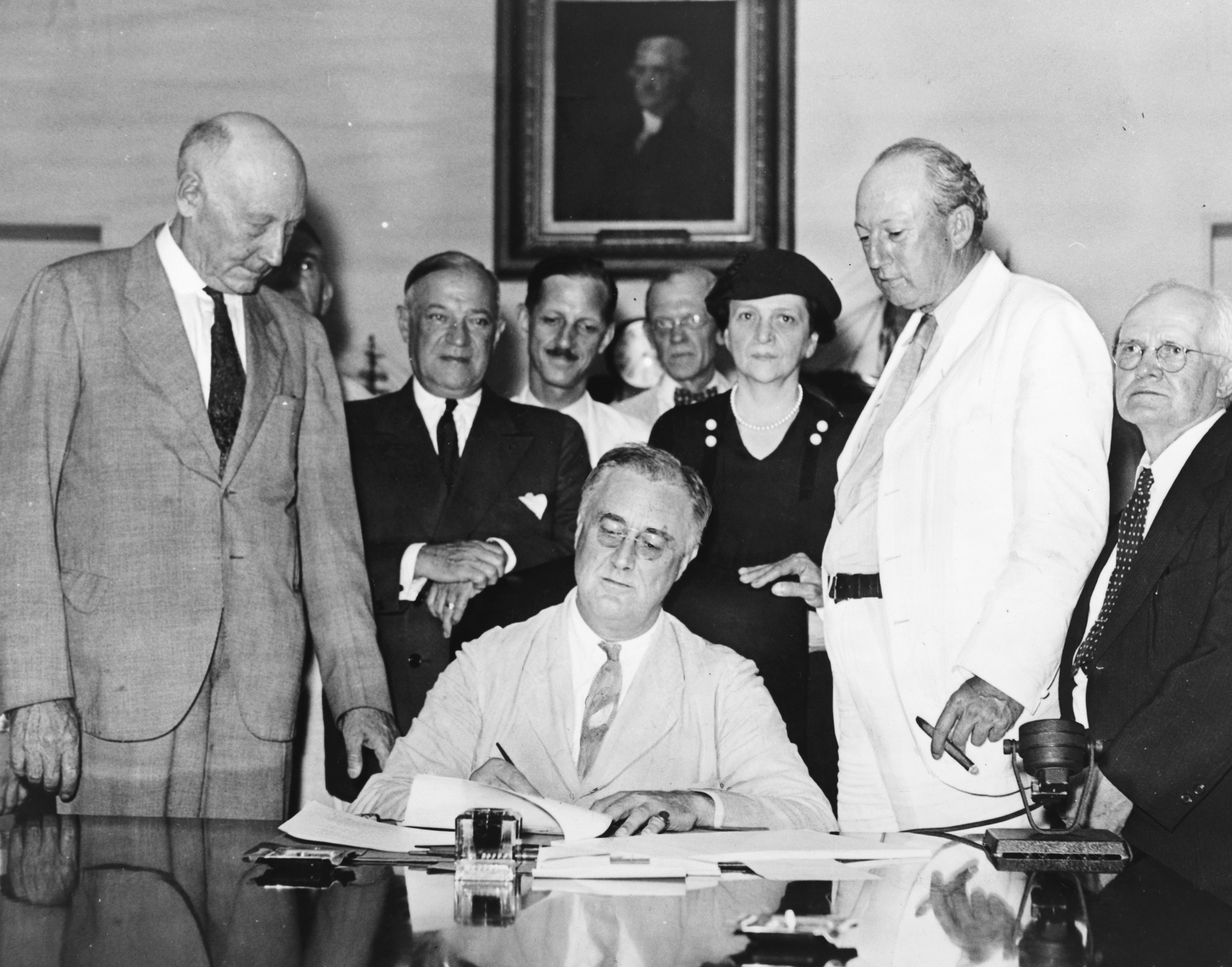 President Roosevelt signed the Social Security Act on August 14, 1935