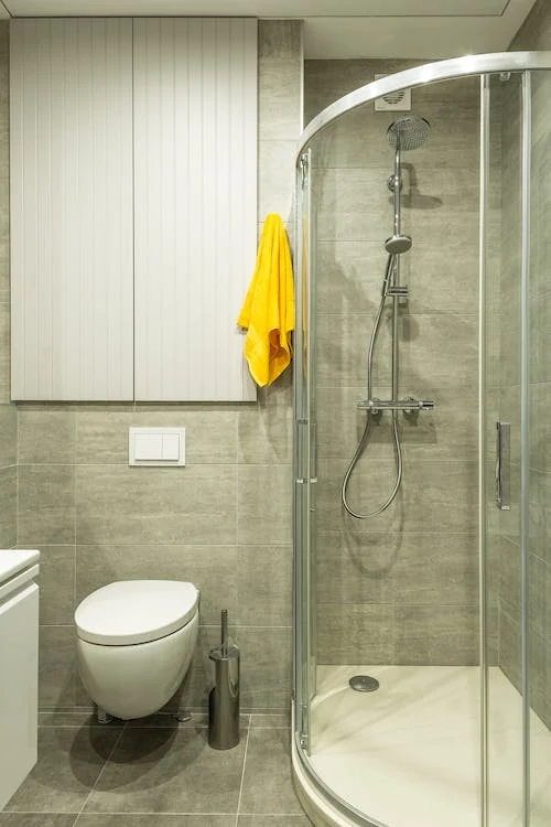 a bathroom with walk in shower